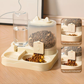 Cream 2-in-1 dog feeder and water dispenser with a gravity water bottle and kibble tank topping up the bowls