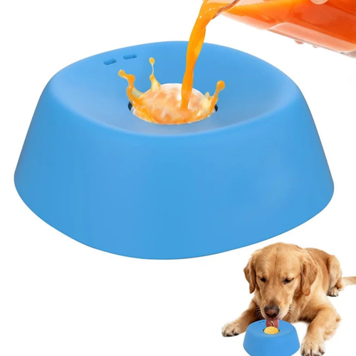 Broth poured over the dome of a blue anti-choking slow feeder dog bowl, dog waiting in the corner