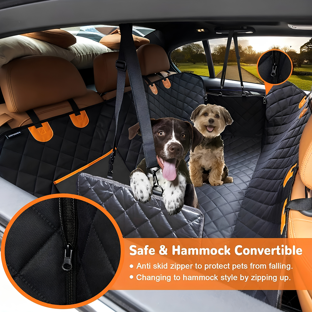 Two dogs sitting on dog car seat cover hammock in back seat with zipper closed for fall protection