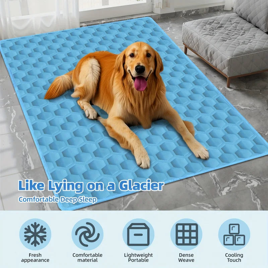 Large golden retriever stretched out on a blue ice silk dog cooling mat by a sofa