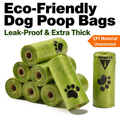 Stacked green rolls of leak proof dog poop bags, extra thick and unscented for everyday walks