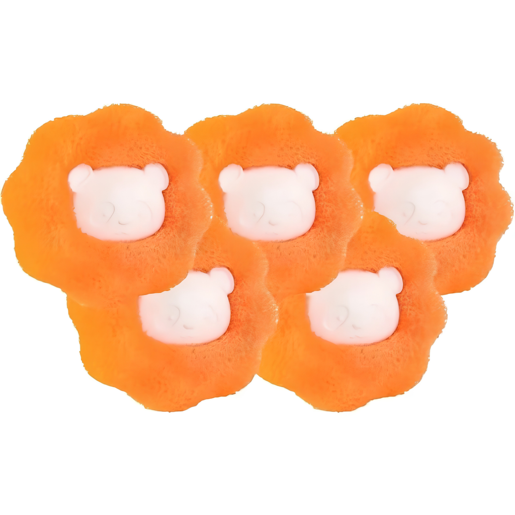 Set of five orange bear-shaped reusable pet hair remover laundry catchers on a white background