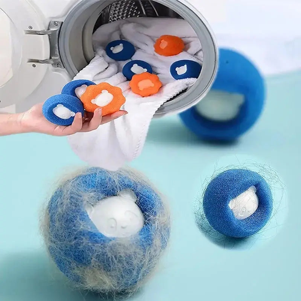 Reusable pet hair remover laundry balls coated in collected fur and lint after a wash cycle