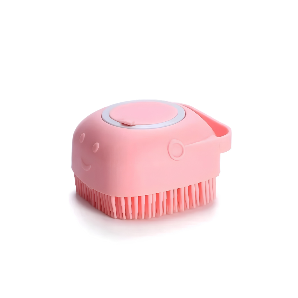 Pink silicone dog bath brush with soap dispenser and smiling face, soft bristle base